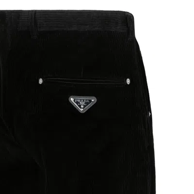 Prada Mid-rise Tapered Denim Jeans In Black