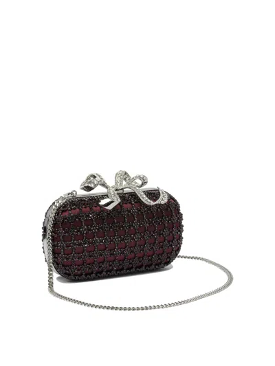 Self-portrait Clutches