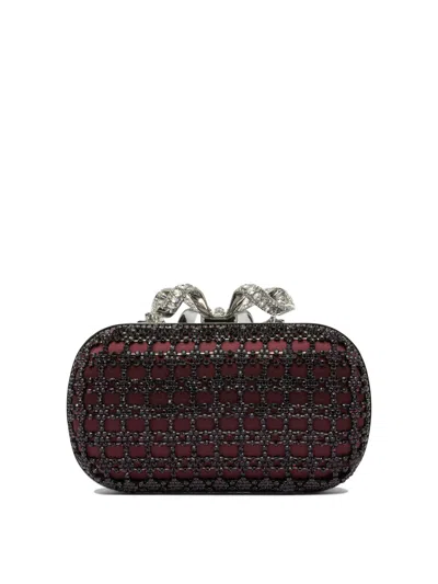 Self-portrait Clutches