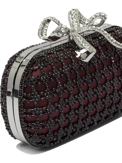 Self-portrait Clutches