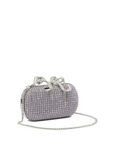 Self-portrait Clutches