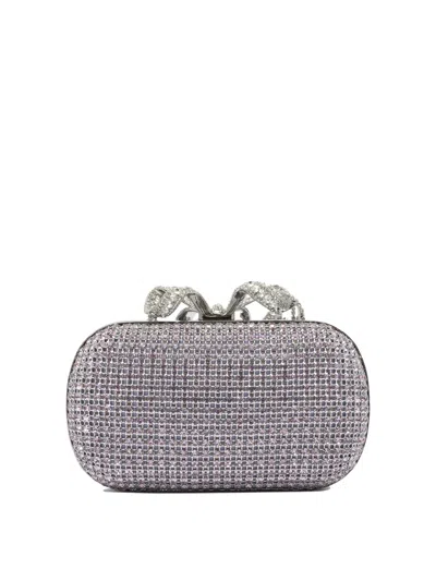 Self-portrait Clutches