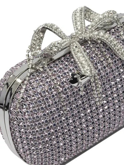 Self-portrait Clutches