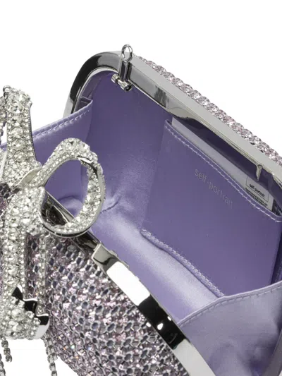 Self-portrait Clutches