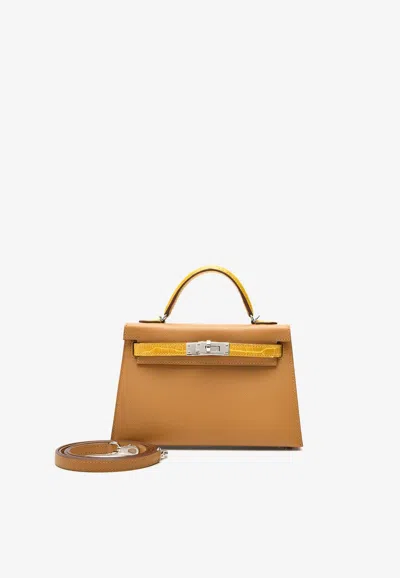 Hermes Mini Kelly 20 Sellier Touch In Sesame Madame And Jaune Ambre Shiny Alligator With Palladium Hardware In Brown