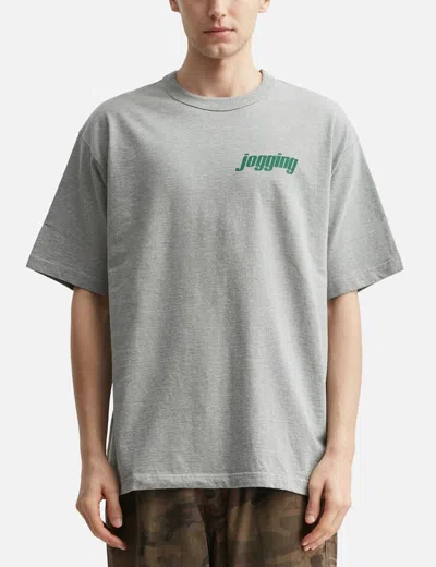Unlikely Authentic Graphic Tee "jogging" In Gray