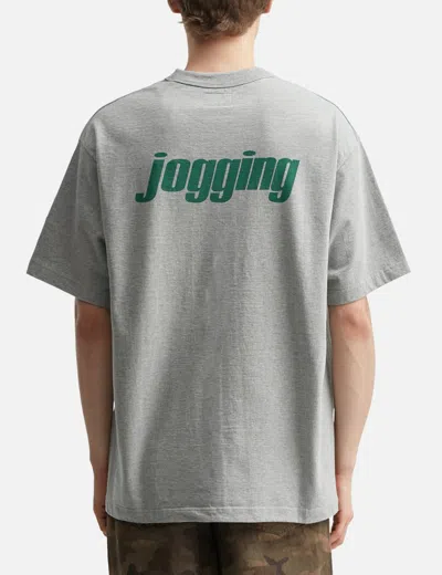Unlikely Authentic Graphic Tee "jogging" In Gray