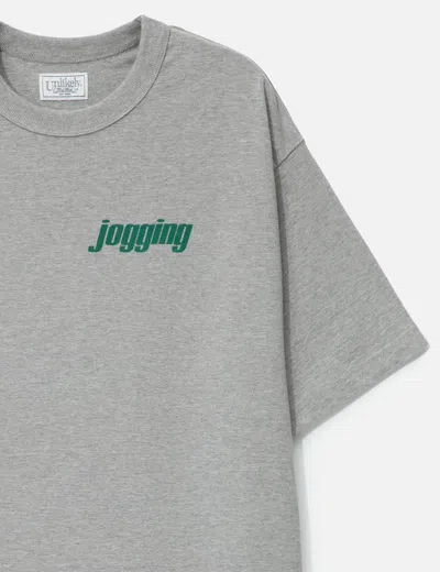 Unlikely Authentic Graphic Tee "jogging" In Gray