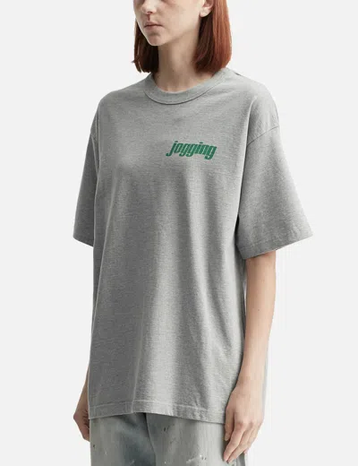 Unlikely Authentic Graphic Tee "jogging" In Gray