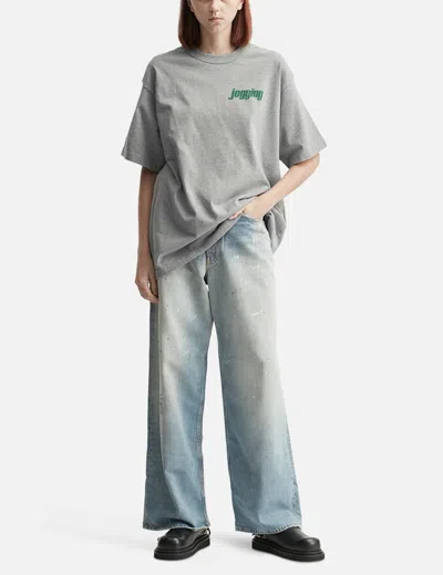 Unlikely Authentic Graphic Tee "jogging" In Gray