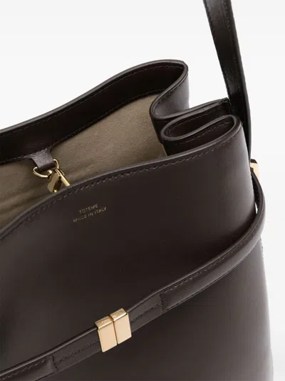 Totême Leather Belted Bucket Bag