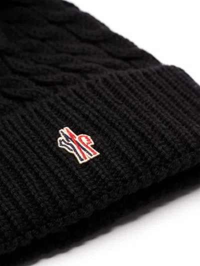 Moncler Wool Hat Featuring Cable Knit And Pom Detail