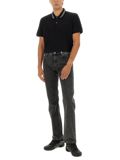 Alexander Mcqueen Polo Shirt With Logo On The Collar In Black