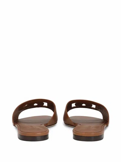 Dolce & Gabbana Leather Slides With Cut-out Logo In Brown