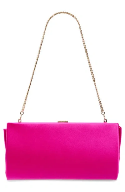 Stuart Weitzman The Vip Loveknot Clutch In Pink