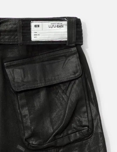 Lựu Dạn Zip-off Cargo Jeans In Black