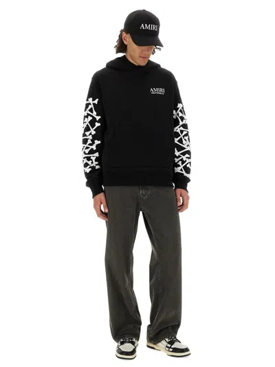 Amiri Stacked Bones Print Hoodie In Black