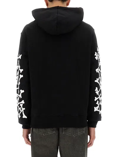 Amiri Stacked Bones Print Hoodie In Black