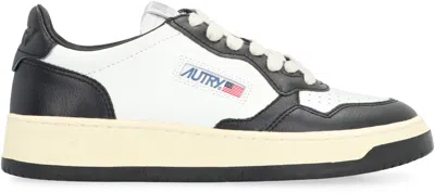 Autry Low-top Leather Sneakers With Navy Overlays And Perforated Details In Black
