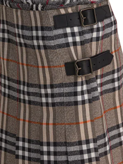 Burberry Plaid Pleated Skirt With Frayed Hem And Buckle Accents In Brown