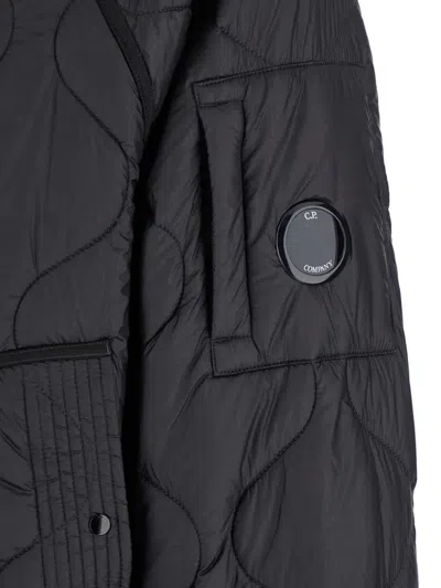 C.p. Company Black Jacket With Fixed Hood And Logo Plaque On The Sleeve In Tech Fabric Man In Black