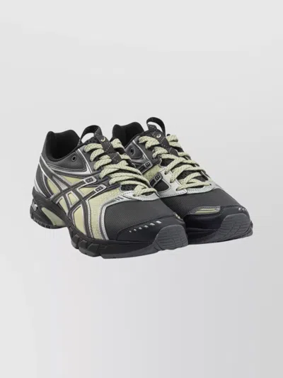 Asics Rounded Toe Sneakers With Grooved Sole And Sleek Finish In Gray