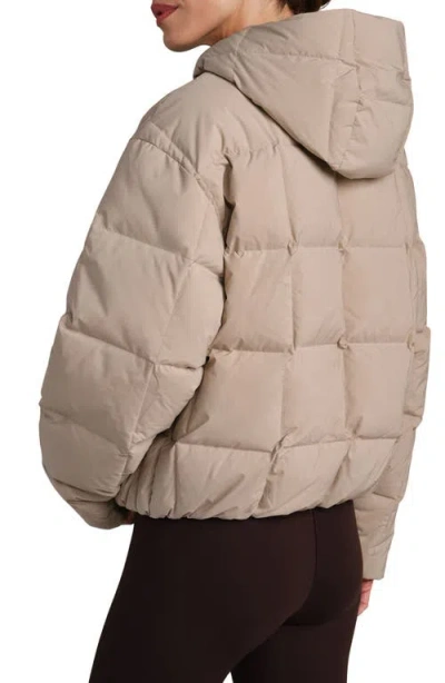 Rhone Powder 650 Fill Power Down Puffer Jacket In Brown