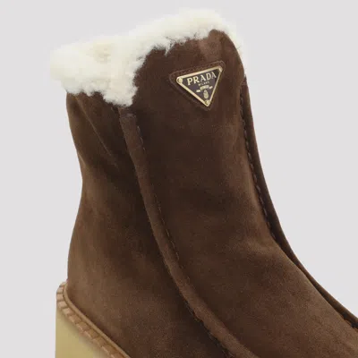 Prada Platform Booties Featuring Shearling Lining In Brown