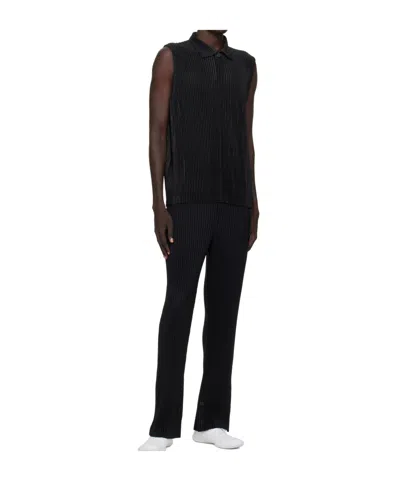 Issey Miyake Tailored Trousers With Button And Pleats In Black