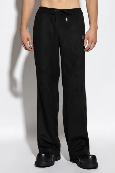 Misbhv Logo-embossed Track Pants In Black