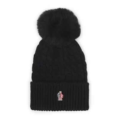 Moncler Wool Hat Featuring Cable Knit And Pom Detail In Black