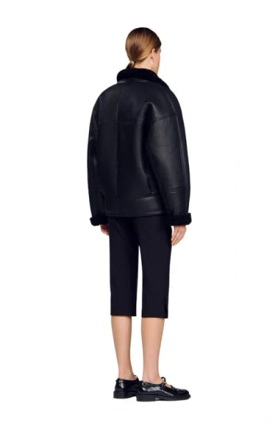 Sandro Short Shearling Coat In Black
