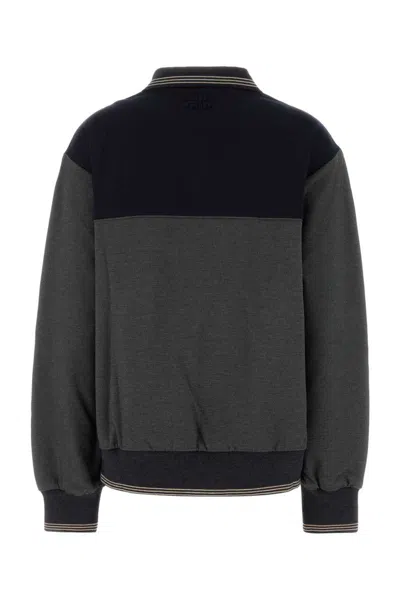 Miu Miu Two-tone Stretch Viscose Blend Oversize Polo Shirt In Black