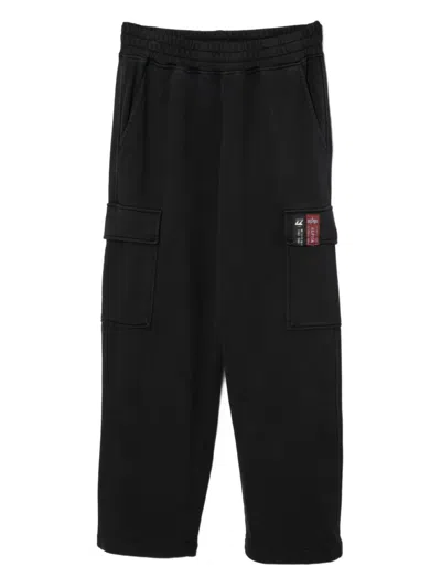 Izzue Logo-patch Trousers In Black