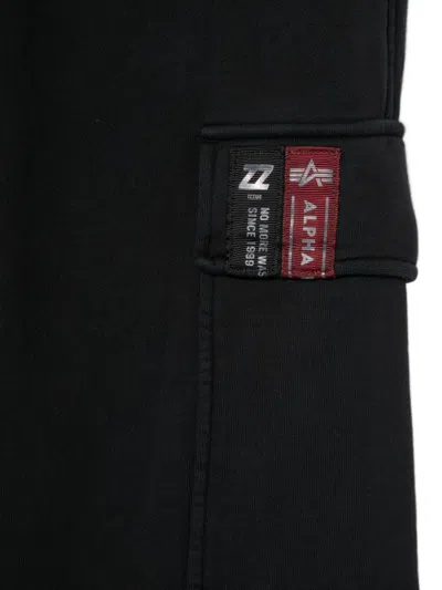 Izzue Logo-patch Trousers In Black