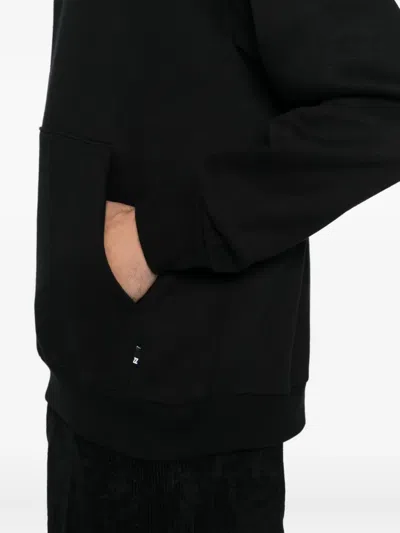 Izzue Logo-embroidered Hoodie In Black