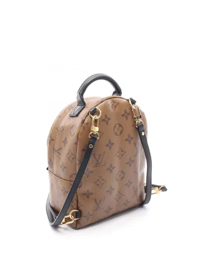 Pre-owned Louis Vuitton 2021-2025 Monogram Reverse Mini Palm Springs Backpack In Brown