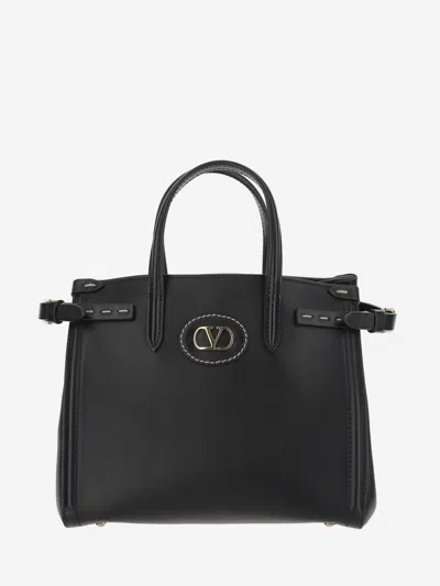 Valentino Garavani Borsa Tote In Pelle Nera Con Manici E Tracolla In Black