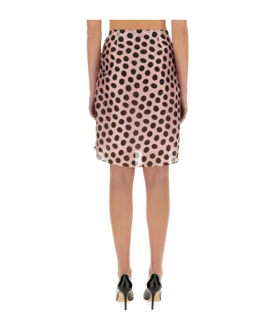 Nina Ricci Polka Dot Seersucker Skirt With Asymmetric Bow In Black On Blush In Pink