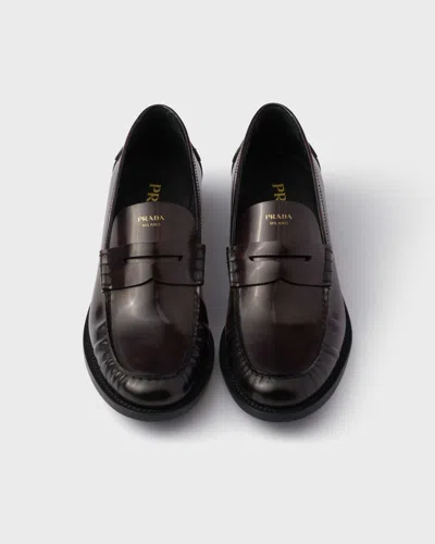 Prada Leather Ruched Penny Loafers In Black