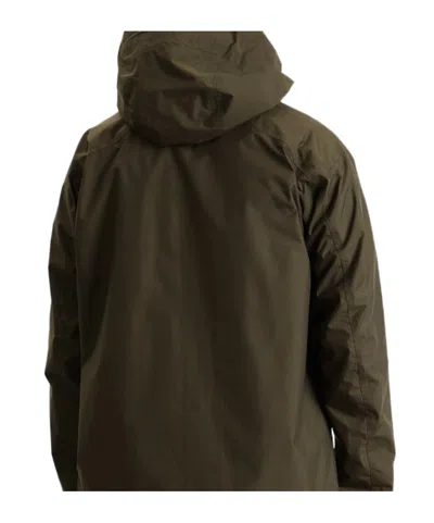 And Wander 2.5l Hiker Rain Jacket In Brown