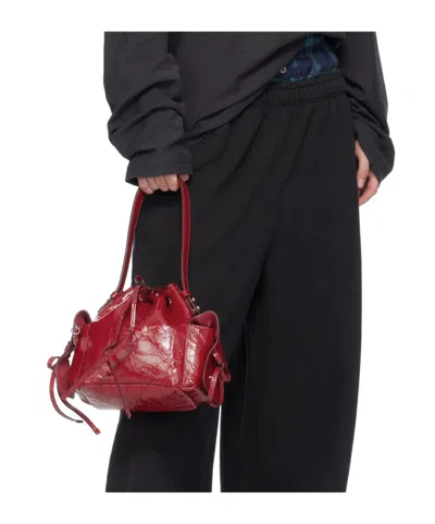Acne Studios Multipocket Mini Bucket Bag Crinkled Patent In Red