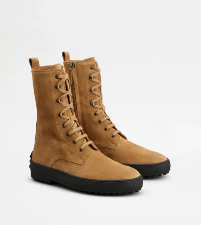 Tod's Suede Ankle Boots Featuring Pull Tab In Brown