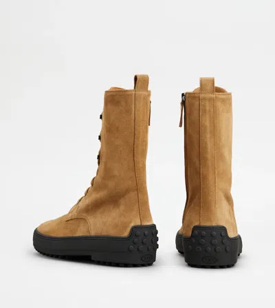 Tod's Suede Ankle Boots Featuring Pull Tab In Brown