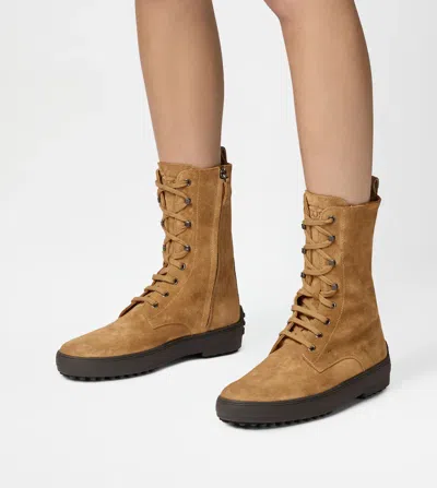 Tod's Suede Ankle Boots Featuring Pull Tab In Brown