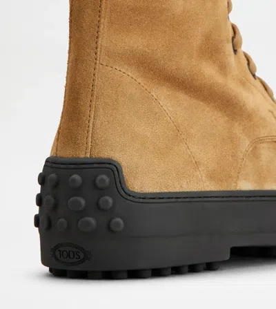 Tod's Suede Ankle Boots Featuring Pull Tab In Brown