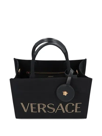 Versace Studded Logo Canvas Tote Bag In Black