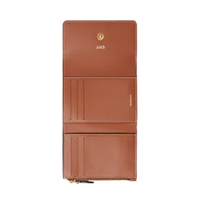 Burberry Book Wallet In Faux Leather In Brown