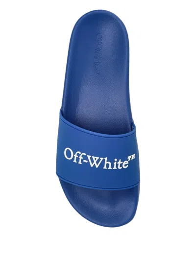 Off-white Logo Embossed Slip-on Slides In Blue