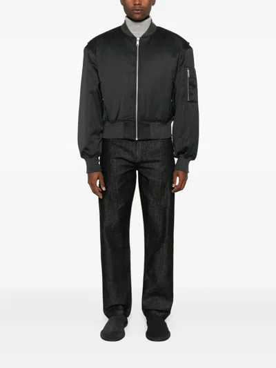 Entire Studios Logo-patch Jeans In Black